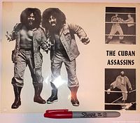Front view of 8"x10" The Cuban Assassins wrestling promo photo with Sharpie for scale