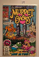 Front cover of bagged and boarded comic showing artwork, imprint and issue details
