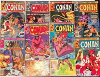 Group shot of all ten Conan the Barbarian comic books laid out in two rows showing front covers