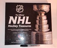 Front cover showing full title, Stanley Cup image, Sharpie for scale