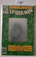 Front view of Spider-Man #26 hologram cover comic in bag and board