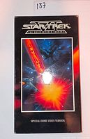 Front of VHS slipcase showing title, artwork and special home video version note