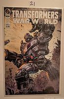 Front view of Transformers: War World #26 comic, bagged and boarded