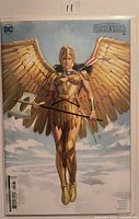 Front cover of Wonder Woman #8 variant in bag and board