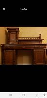 Full view of desk base and upper hutch showing carving and layout
