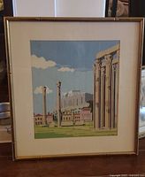Needlepoint Greek ruins artwork in brass bamboo frame