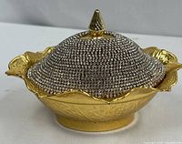Gold-tone covered dish with rhinestone lid, side view