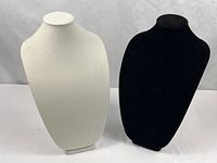 Front view of both necklace bust stands