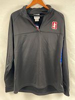 Front view of black Champion quarter-zip pullover with Stanford logo