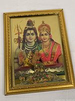 Full view of framed foil print showing deities and frame