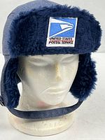 Front view showing USPS patch, faux fur flap and chin strap