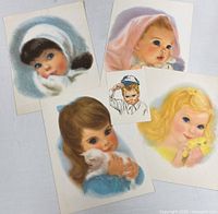 All five prints arranged on surface