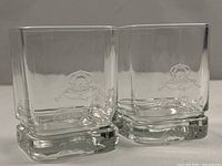 Both Crown Royal 2000 rocks glasses angled view