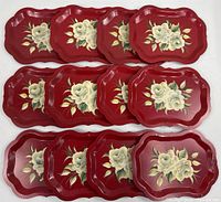 All 12 maroon metal trays laid out showing rose motif