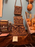 Group of coconut bead bags displayed, showing quantity and style