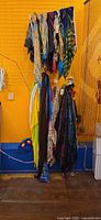 Rack holding numerous colourful scarves, sarongs and pareos
