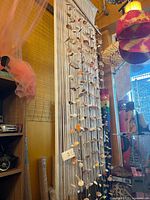 Full view of hanging seashell door curtain showing overall size and construction
