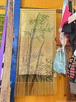 Hanging wood bead curtain showing bamboo design