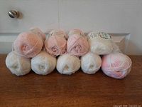 All eleven skeins arranged in two rows showing colours