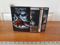 Front view of boxed Blade Trilogy set standing on table
