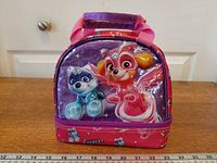 Front view showing Skye and Everest graphics and carry handle