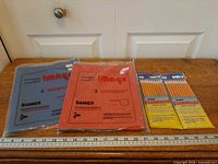 All four packaged items with ruler for scale