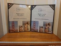 Both sealed Mainstays frames side by side