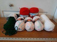 Group shot of seven skeins in assorted colors