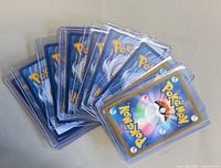 All ten cards fanned in sleeves