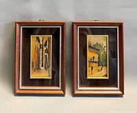 Front view of both framed chromolithographs