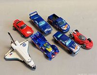 Group shot of seven diecast vehicles