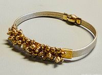 Full view of bangle showing bubble cluster detail and clasp