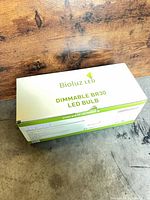 Closed retail box showing Bioluz LED branding and model info