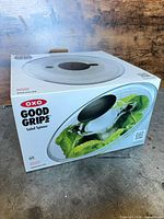 Retail box showing OXO Good Grips salad spinner graphics
