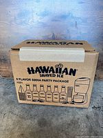 Closed shipping box showing branding and 6 Flavor S900A Party Package graphics