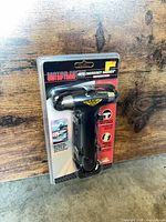 Front view of sealed Motor Trend Auto Emergency Hammer in blister packaging
