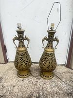 Both brass lamps full view