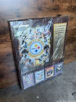 Front view of sealed Steelers Super Bowl Champions plaque showing full design and cards