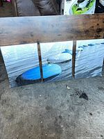 Front view of all three canvas panels still wrapped