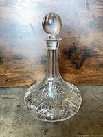 Full view of decanter with stopper in place showing overall shape and clarity