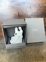 Topper inside original grey presentation box