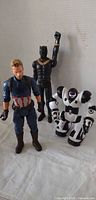 Group view of Captain America, Black Panther and Robosapien figures