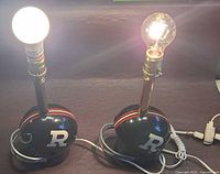 Both helmet lamps lit to show working condition