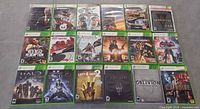 Full group shot of all 18 Xbox 360 game cases
