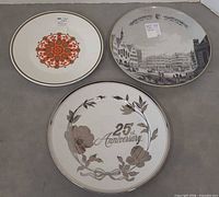Front view of all three plates showing designs and sizes