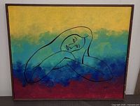 Full view of framed painting showing colors, composition, and frame