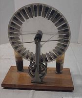 Front view showing disk, Leyden jars, crank and base