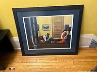 Framed Edward Hopper print on floor, showing artwork, mat, frame and scale