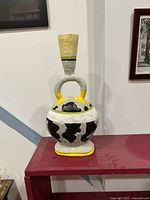 Full view of ceramic vase showing design and form