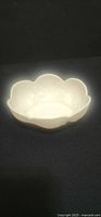 Top view of ivory scalloped porcelain bowl